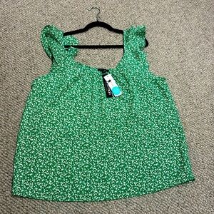 Kelly green flutter sleeve top.